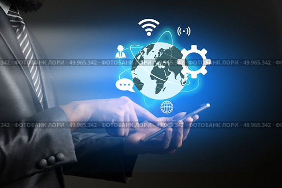 Businessman touching on technology smartphone with business glob. Businessman touching on technology smartphone with business global icons on screen. Business technology concept. Стоковое фото, агентство Ingram Publishing / Фотобанк Лори