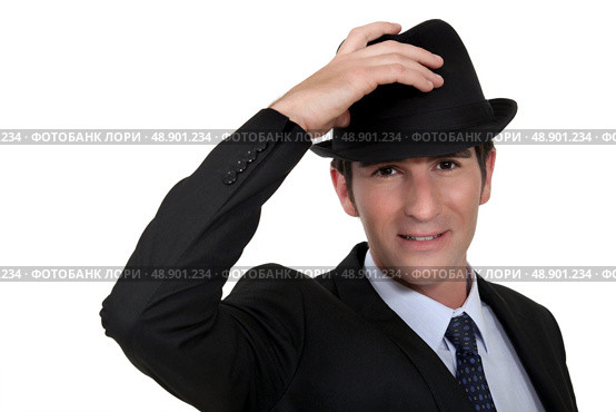 Businessman wearing trilby. Стоковое фото, агентство Ingram Publishing / Фотобанк Лори