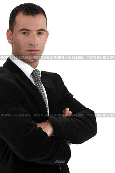 Businessman with his arms crossed. Стоковое фото, агентство Ingram Publishing / Фотобанк Лори