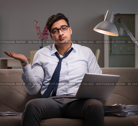 Businessman workaholic working late at home. Стоковое фото, фотограф Elnur / Фотобанк Лори