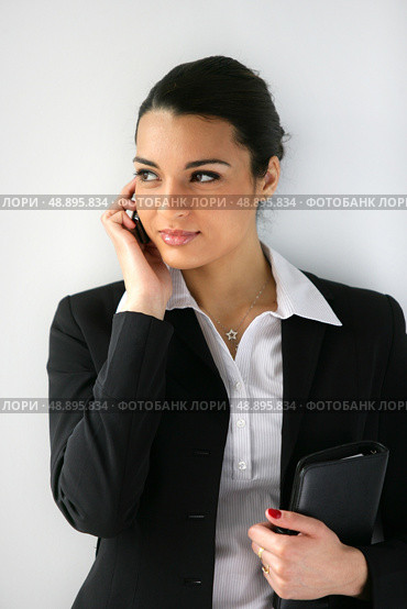 Businesswoman clutching diary. Стоковое фото, агентство Ingram Publishing / Фотобанк Лори