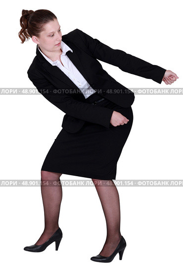 Businesswoman pulling something. Стоковое фото, агентство Ingram Publishing / Фотобанк Лори