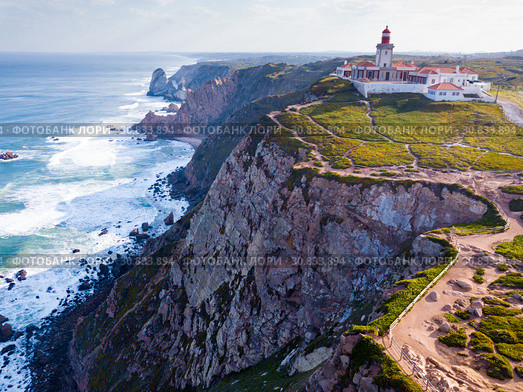 Cabo da Roca Lighthouse. Portuguese Farol de Cabo da Roca is most westerly European extent (2019 год). Стоковое фото, фотограф Яков Филимонов / Фотобанк Лори