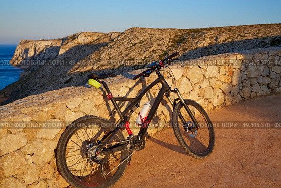 Cabo San Antonio Cape in Denia aerial with mountain bike MTB at Spain. Стоковое фото, агентство Ingram Publishing / Фотобанк Лори