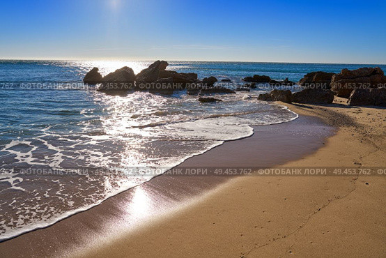 Cala Les Sirenes beach playa in Miami-Platja of Tarragona at Costa Dorada of Catalonia. Стоковое фото, агентство Ingram Publishing / Фотобанк Лори