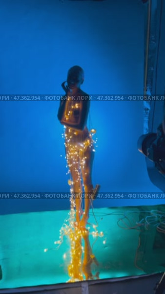 Captivating beauty in lingerie with enchanting lights at backstage setting. Стоковое видео, видеограф Гурьянов Андрей / Фотобанк Лори