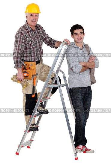 Carpenter taking on new trainee. Стоковое фото, агентство Ingram Publishing / Фотобанк Лори