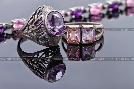 Carved silver ring with a blue gem and a silver bracelet. Стоковое фото, фотограф Сергей Сергеев / Фотобанк Лори