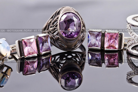Carved silver ring with earrings with purple gemstones. Стоковое фото, фотограф Сергей Сергеев / Фотобанк Лори