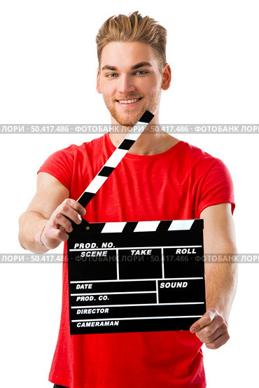 Casual young man holding a clapboard, over a white background. Стоковое фото, агентство Ingram Publishing / Фотобанк Лори