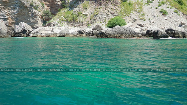 Cave Pecin bay between Petrovac - Sutomore. Hills, inaccessible rocks. Montenegro Flysch, marine sedimentary rocks, lithological layers. Adriatic Mediterranean sea Vezirova Ratkova Plaza, Budva (2024 год). Стоковое видео, видеограф Юлия Петровская / Фотобанк Лори