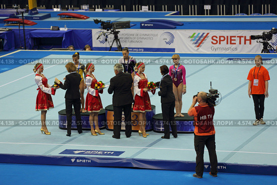 Чемпионат Европы по спортивной гимнастике 2013 года. Москва, СК "Олимпийский". Победители состязаний на бревне - Лариса Йордаке (Larisa Iordache), Диана Булимар (Diana Bulimar) и Анастасия Гришина (Anastasia Grishina) Редакционное фото, фотограф Игорь Долгов / Фотобанк Лори