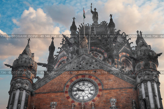 Chhatrapati Shivaji, the former Victoria Terminus - a historical railway station in the Indian city of Mumbai, one of the busiest in India. Стоковое фото, агентство Ingram Publishing / Фотобанк Лори