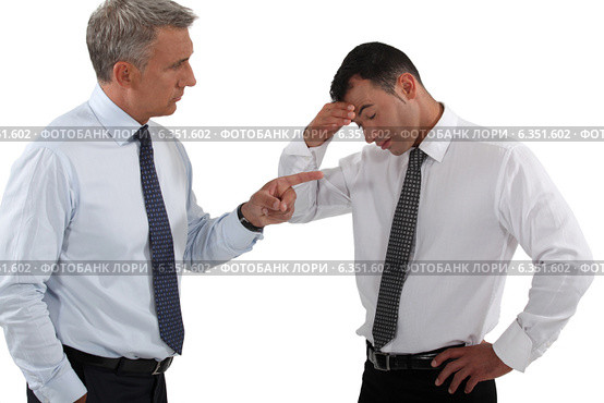 Chief taunting employee. Стоковое фото, фотограф Phovoir Images / Фотобанк Лори