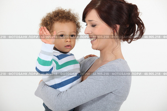 Child waving good-bye. Стоковое фото, агентство Ingram Publishing / Фотобанк Лори