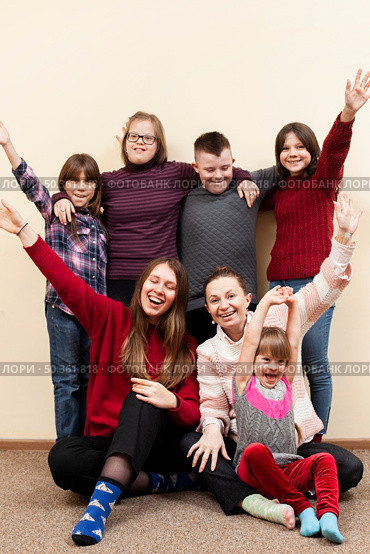 children with down syndrome woman posing happily. Стоковое фото, агентство Ingram Publishing / Фотобанк Лори