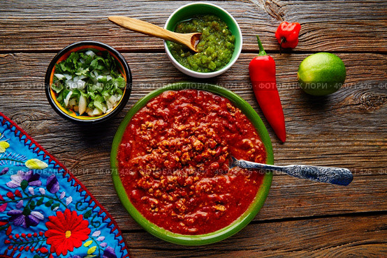 Chili with meat platillo Mexican food with sauces. Стоковое фото, агентство Ingram Publishing / Фотобанк Лори