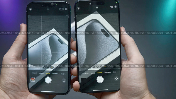 China, Beijing - September 15, 2023: Close-up of iPhone screens in comparison of cameras. Редакционное фото, фотограф David Kashakhi / Фотобанк Лори