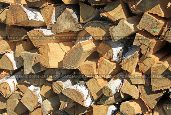 Chopped and stacked birch firewood as a background. Стоковое фото, фотограф Шилер Анастасия / Фотобанк Лори