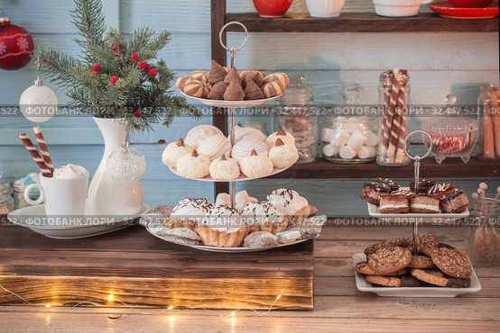 Christmas bar cacao decoration with cookies and sweets on blue wooden background in vintage style. Стоковое фото, фотограф Майя Крученкова / Фотобанк Лори