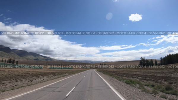 Чуйский тракт на Алтае / Video of driving in a car along mountain road Chuya Highway in Altai. Стоковое видео, видеограф Сергей Пристяжнюк (Serg Zastavkin) / Фотобанк Лори
