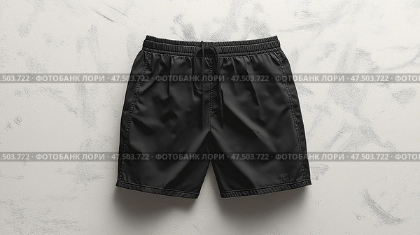 Classic black swim shorts suitable for beach or pool activities. Классические черные плавательные шорты подойдут для пляжа или бассейна. Стоковое AI-изображение, AI-художник Katsiaryna Repich / Фотобанк Лори