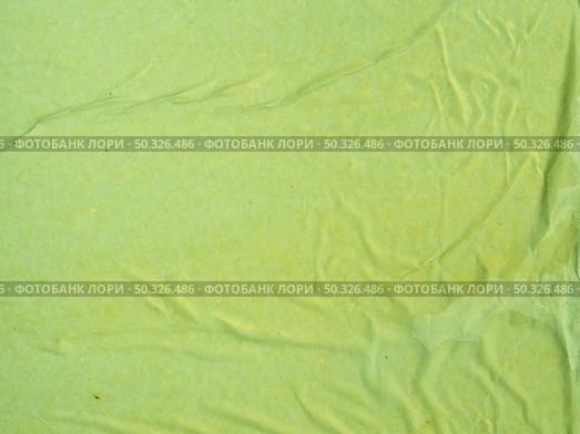 close up green crumpled paper background. Resolution and high quality beautiful photo. close up green crumpled paper background. High quality beautiful photo concept. Стоковое фото, агентство Ingram Publishing / Фотобанк Лори