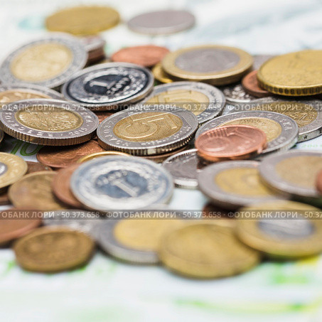 close up metallic coins. Стоковое фото, агентство Ingram Publishing / Фотобанк Лори