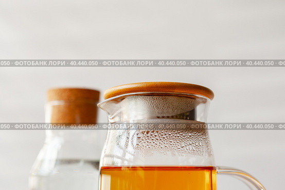 Close up of a glass bottleneck with liquid. Стоковое фото, фотограф Сергей Толмачёв / Фотобанк Лори