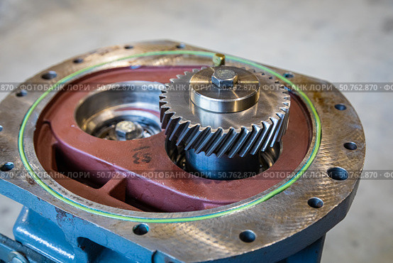 Close up of gearbox showing rotating gears and mechanical components. Стоковое фото, фотограф Юрий Поздников / Фотобанк Лори
