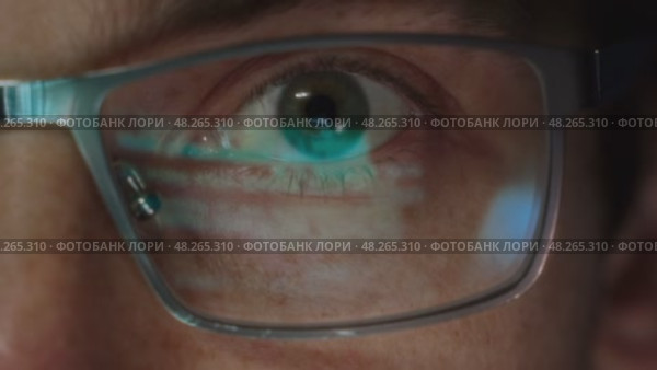 Close-up of programmer with code reflection. Стоковое видео, видеограф Arsenii Palivoda / Фотобанк Лори