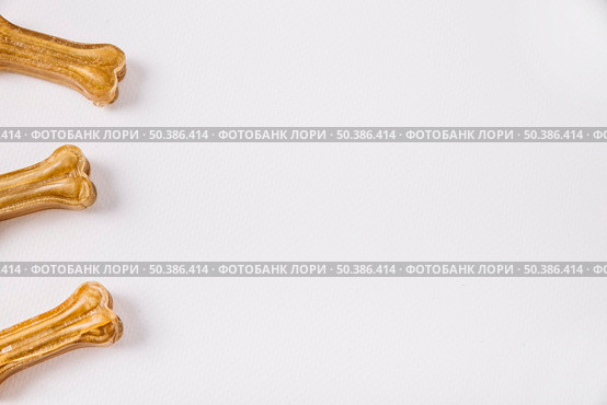 close up three chewing bones. Стоковое фото, агентство Ingram Publishing / Фотобанк Лори