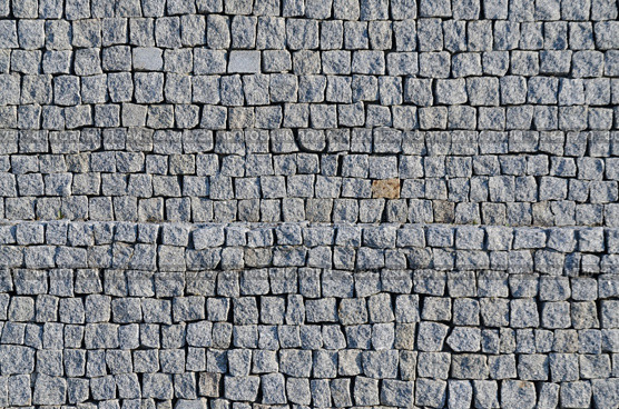Cobbled pavement pattern made of granite cubes. Стоковое фото, агентство Ingram Publishing / Фотобанк Лори