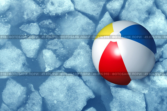 Cold summer weather concept with a plastic inflatabe beach ball stuck in frozen ice in a freezing pool as a symbol of leisure activity problems caused by colder temperatures during vacations and family holidays. Стоковое фото, агентство Ingram Publishing / Фотобанк Лори