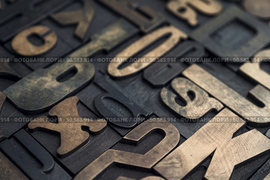Collection of various wood type letters for printing with selective focus. Стоковое фото, агентство Ingram Publishing / Фотобанк Лори