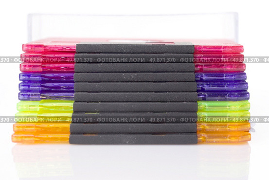 Color floppy disks in box isolated on white. Стоковое фото, агентство Ingram Publishing / Фотобанк Лори