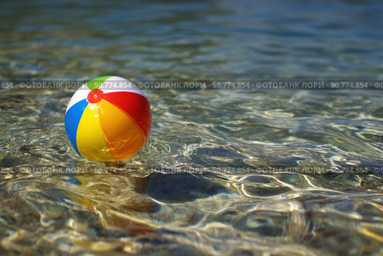 Colorful beach ball floating on water. Стоковое AI-изображение, AI-художник Boris Vasilenko / Фотобанк Лори