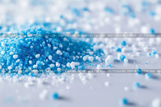 Colorful blue and white sugar crystals scattered on a surface. Разноцветные голубые и белые кристаллы, рассыпанные по поверхности. Стоковое AI-изображение, AI-художник Katsiaryna Repich / Фотобанк Лори