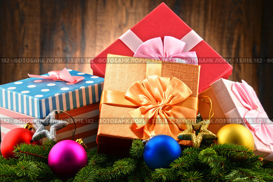 Colorful gift boxes and christmas tree. Стоковое фото, фотограф Z Jan / Smarterpix / Фотобанк Лори
