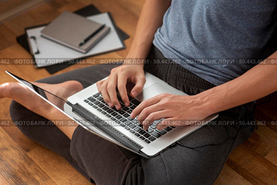 comfortable man using laptop home quarantine work. Стоковое фото, агентство Ingram Publishing / Фотобанк Лори