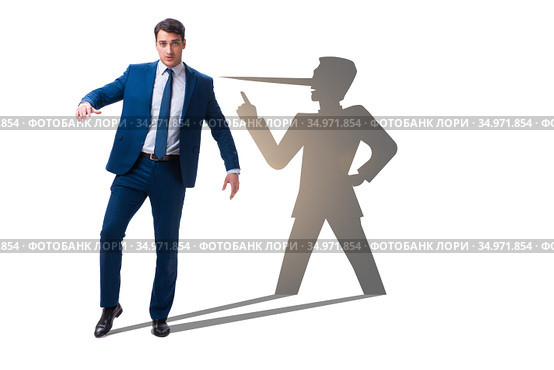 Concept of businessman liar with his shadow. Стоковое фото, фотограф Elnur / Фотобанк Лори
