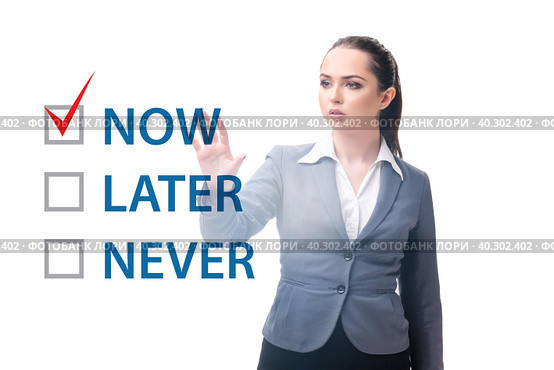 Concept of procrastination with now or later. Стоковое фото, фотограф Elnur / Фотобанк Лори