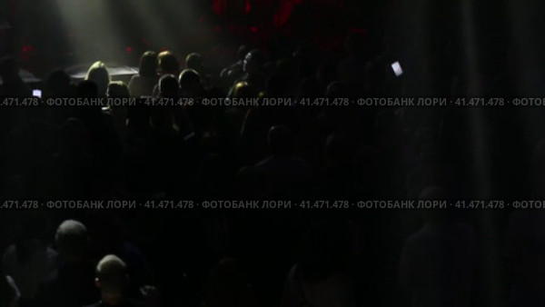 Concert of the symphony orchestra under bright scenic spotlights. Редакционное видео, видеограф Евгений Ткачёв / Фотобанк Лори