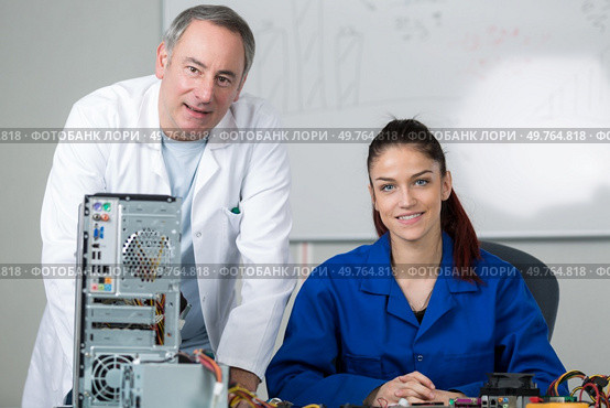 confident student and informatics teacher. Стоковое фото, агентство Ingram Publishing / Фотобанк Лори