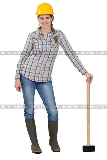 Construction worker with a sledgehammer. Стоковое фото, агентство Ingram Publishing / Фотобанк Лори