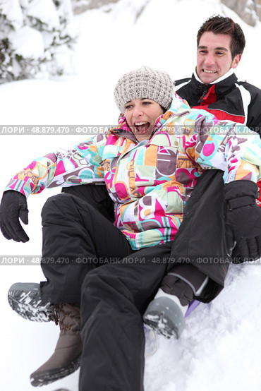 Couple on a sledge. Стоковое фото, агентство Ingram Publishing / Фотобанк Лори