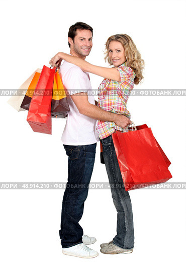 Couple with store bags. Стоковое фото, агентство Ingram Publishing / Фотобанк Лори