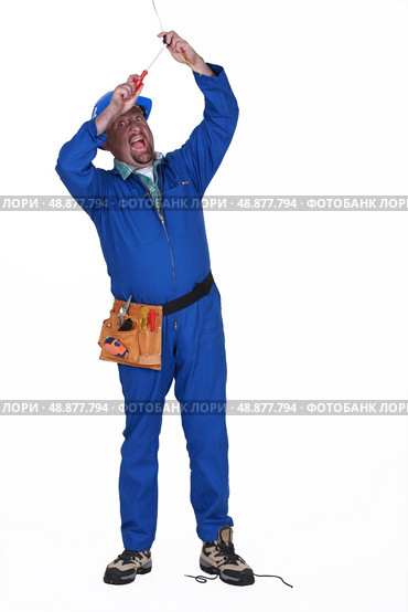 craftsman cleaning chimney. Стоковое фото, агентство Ingram Publishing / Фотобанк Лори