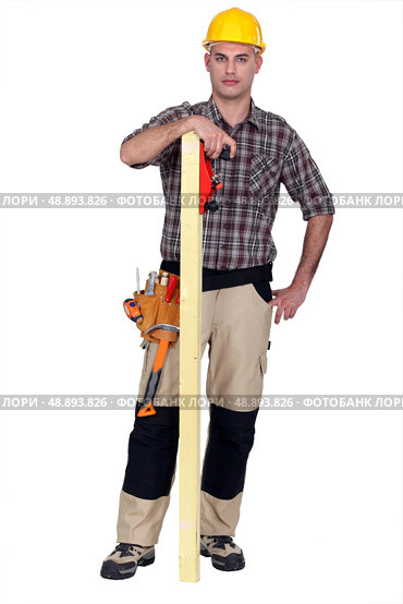 Craftsman with wood lath. Стоковое фото, агентство Ingram Publishing / Фотобанк Лори