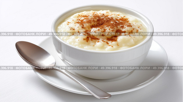 Creamy rice pudding served with cinnamon on a light surface. Сливочный рисовый пудинг с корицей на светлой поверхности. Стоковое AI-изображение, AI-художник Katsiaryna Repich / Фотобанк Лори
